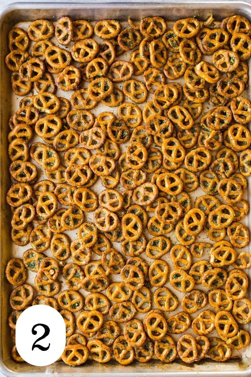 Baked pretzels on an aluminum pan.