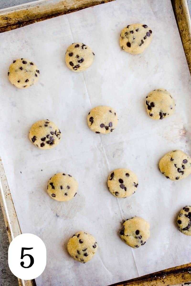 Cookie dough balls that have been flattened.