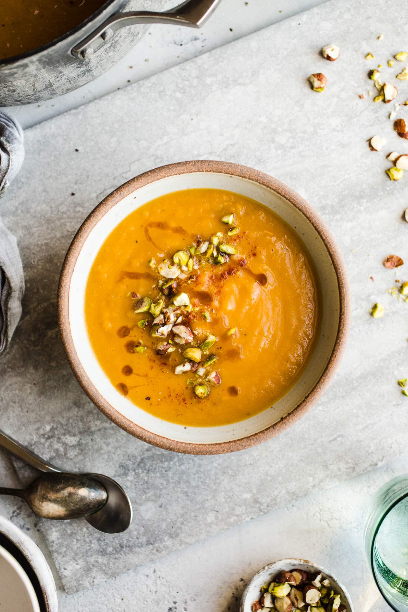 Creamy Vegan Sweet Potato Soup is gluten-free and ready in just 30 minutes. Made with minimal ingredients and warming spices for a spicy sweet soup.