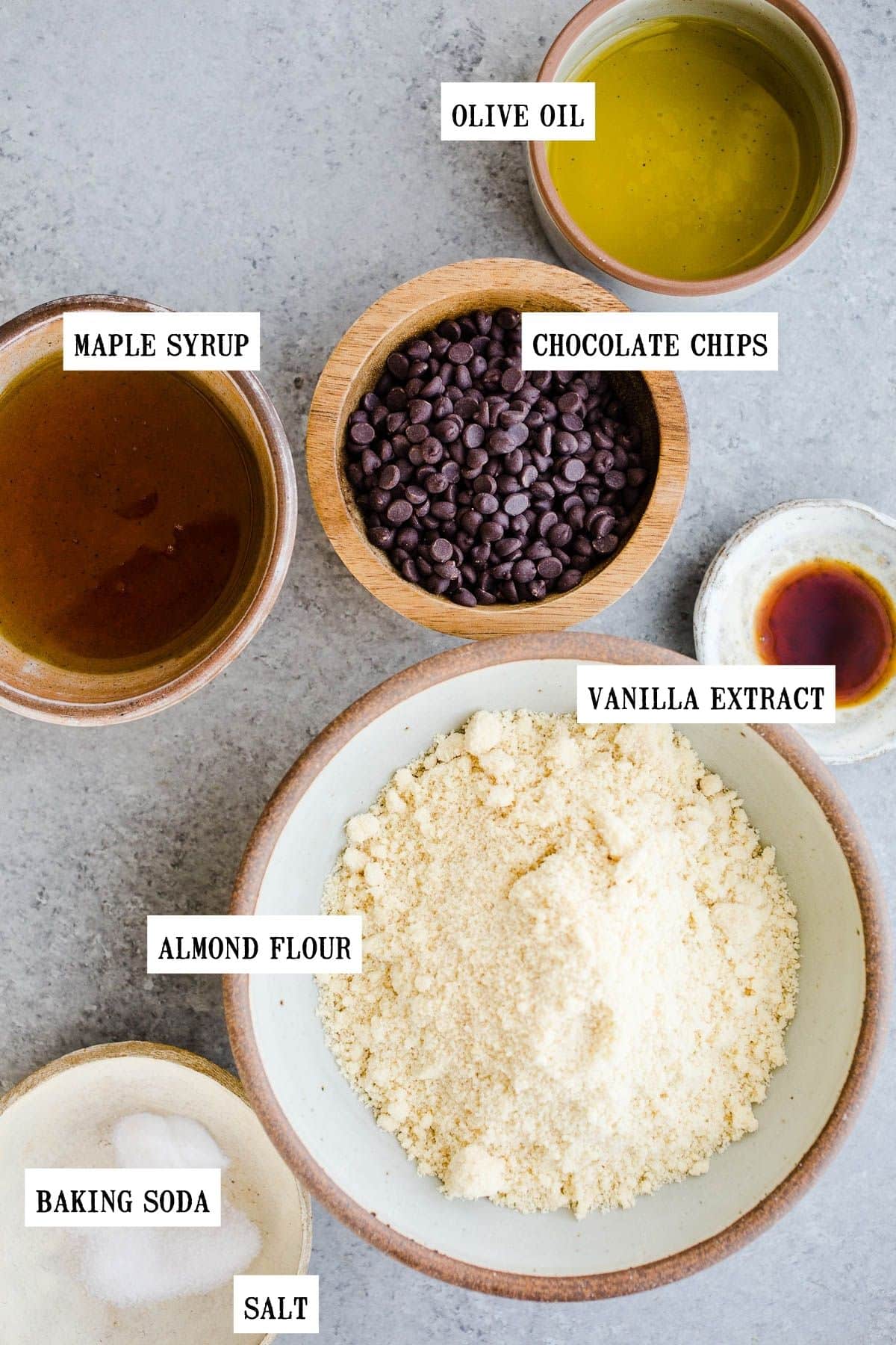 Ingredients for almond flour cookies in small bowls.