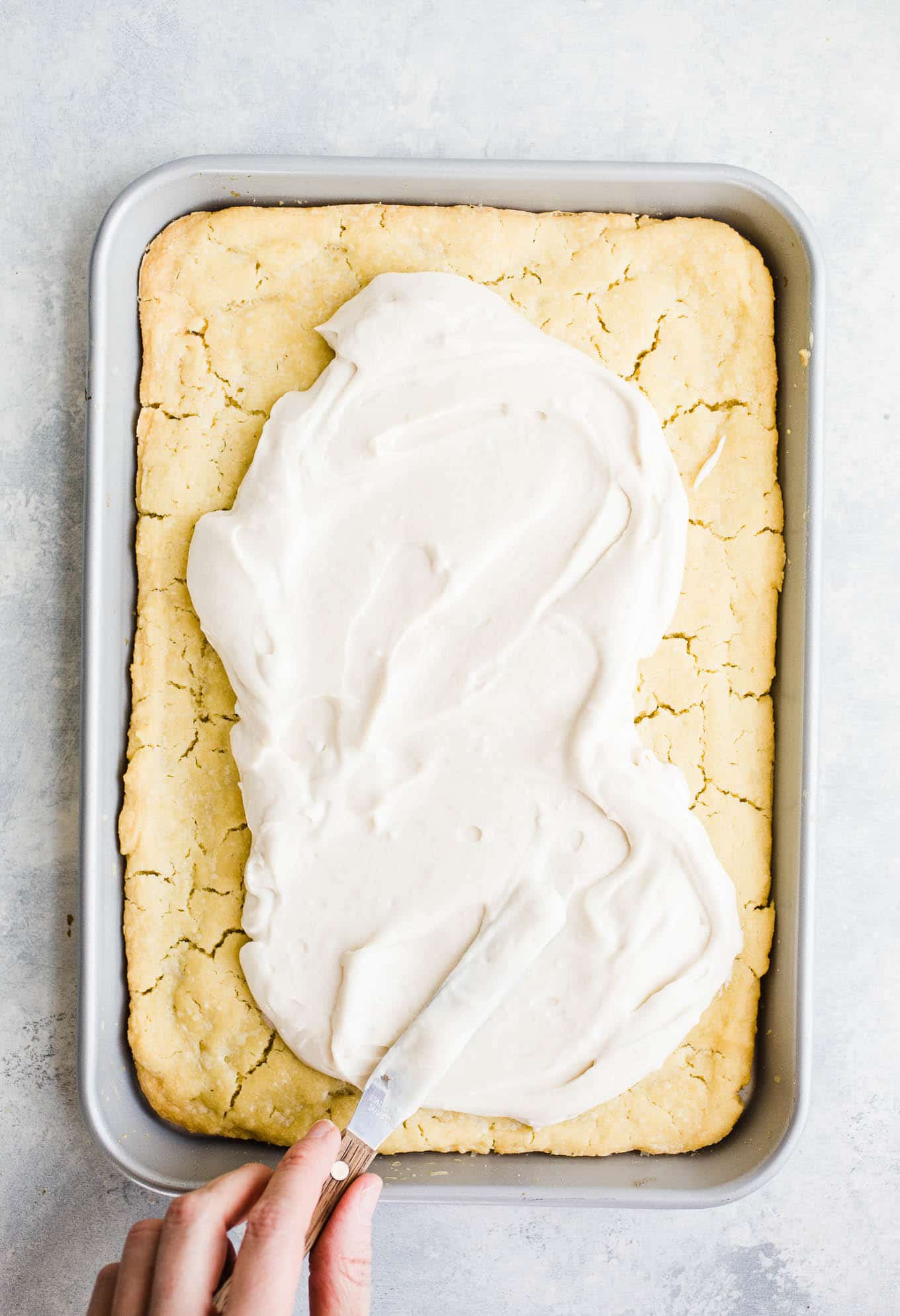 Biscuits and cream in a sheet pan.