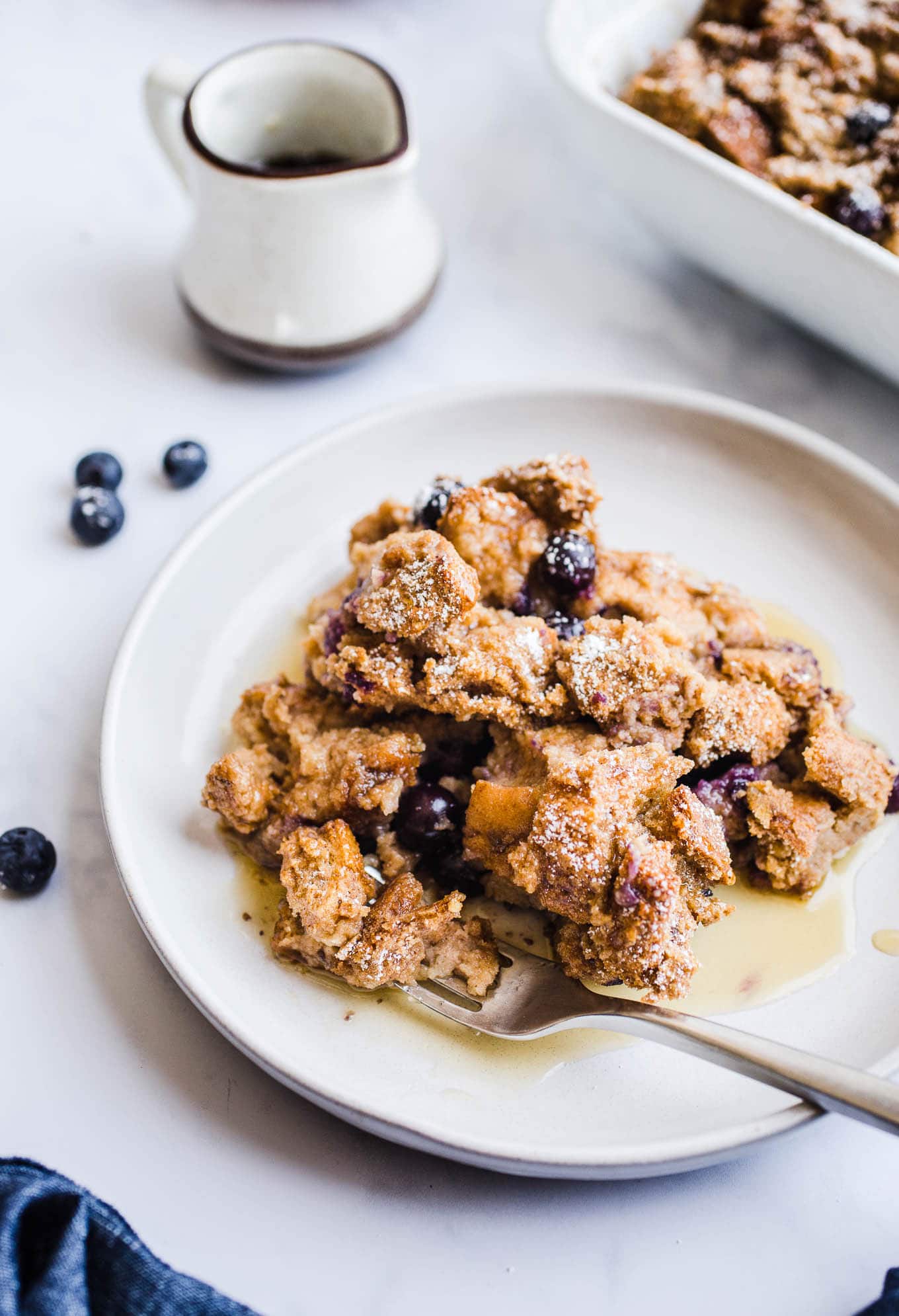 A portion of French toast casserole on a plate. 