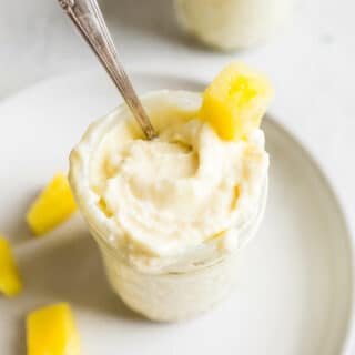 Creamy Homemade Dole Whip in a glass mason jar.