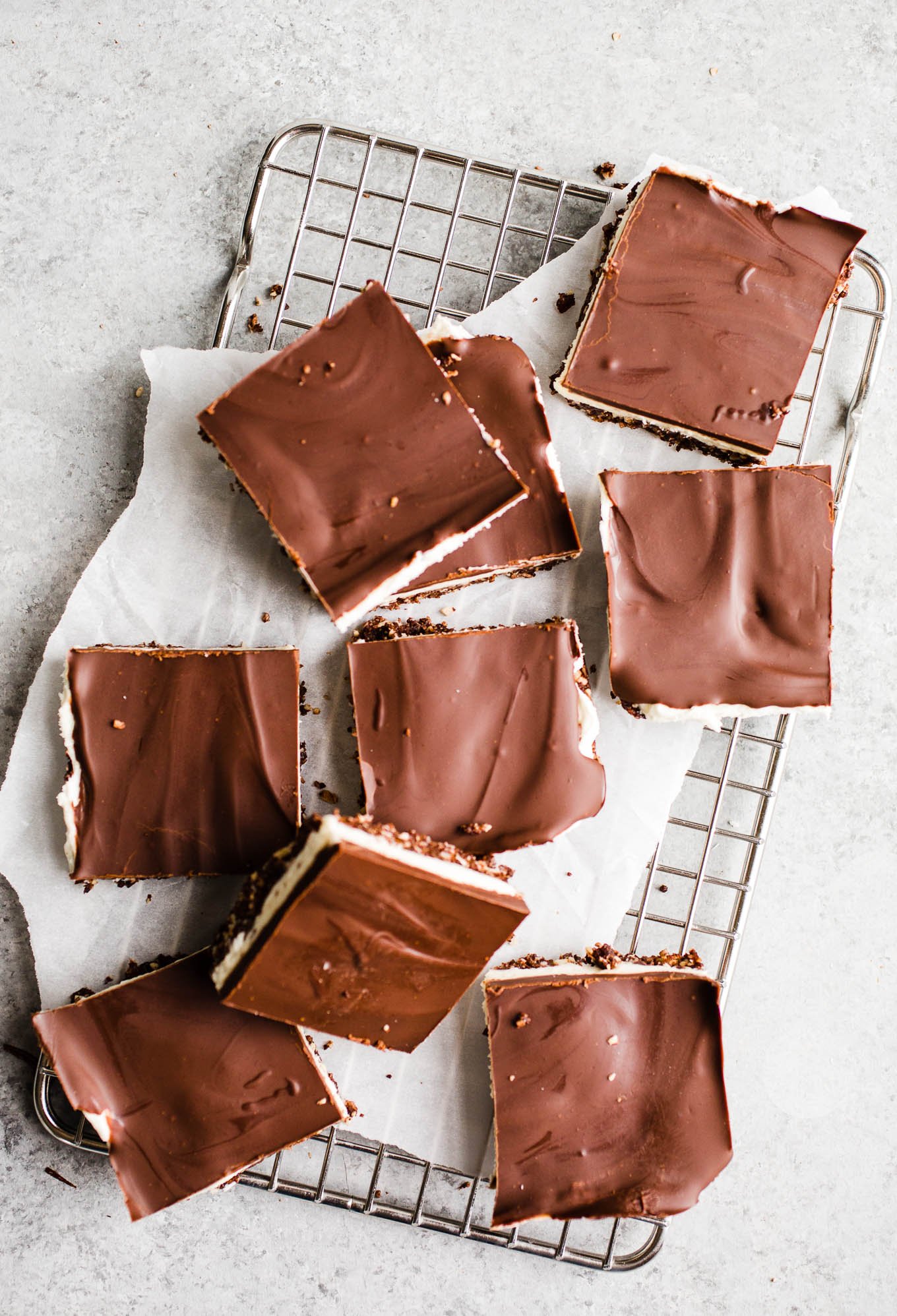 Layered chocolate bars on a wire rack.