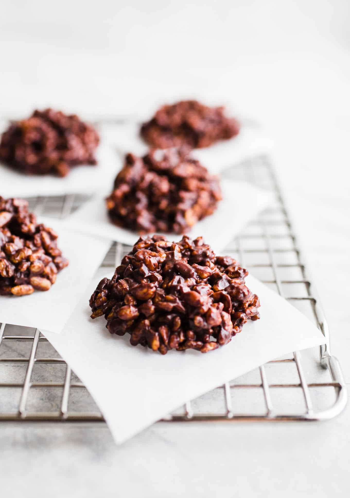 Chocolate caramel crunch cookies on a wire rack. 