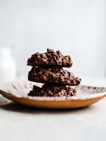 Breakfast cookies stacked on a plate.