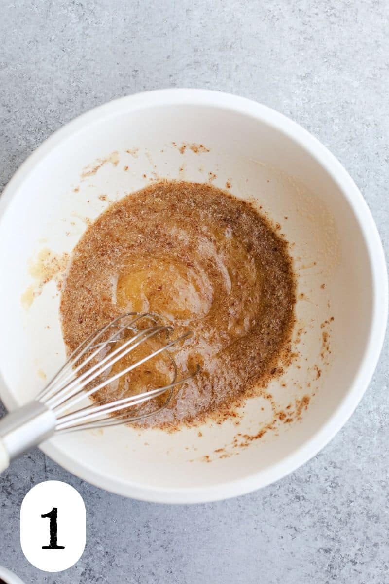 Flaxseed and sugar in a mixing bowl.