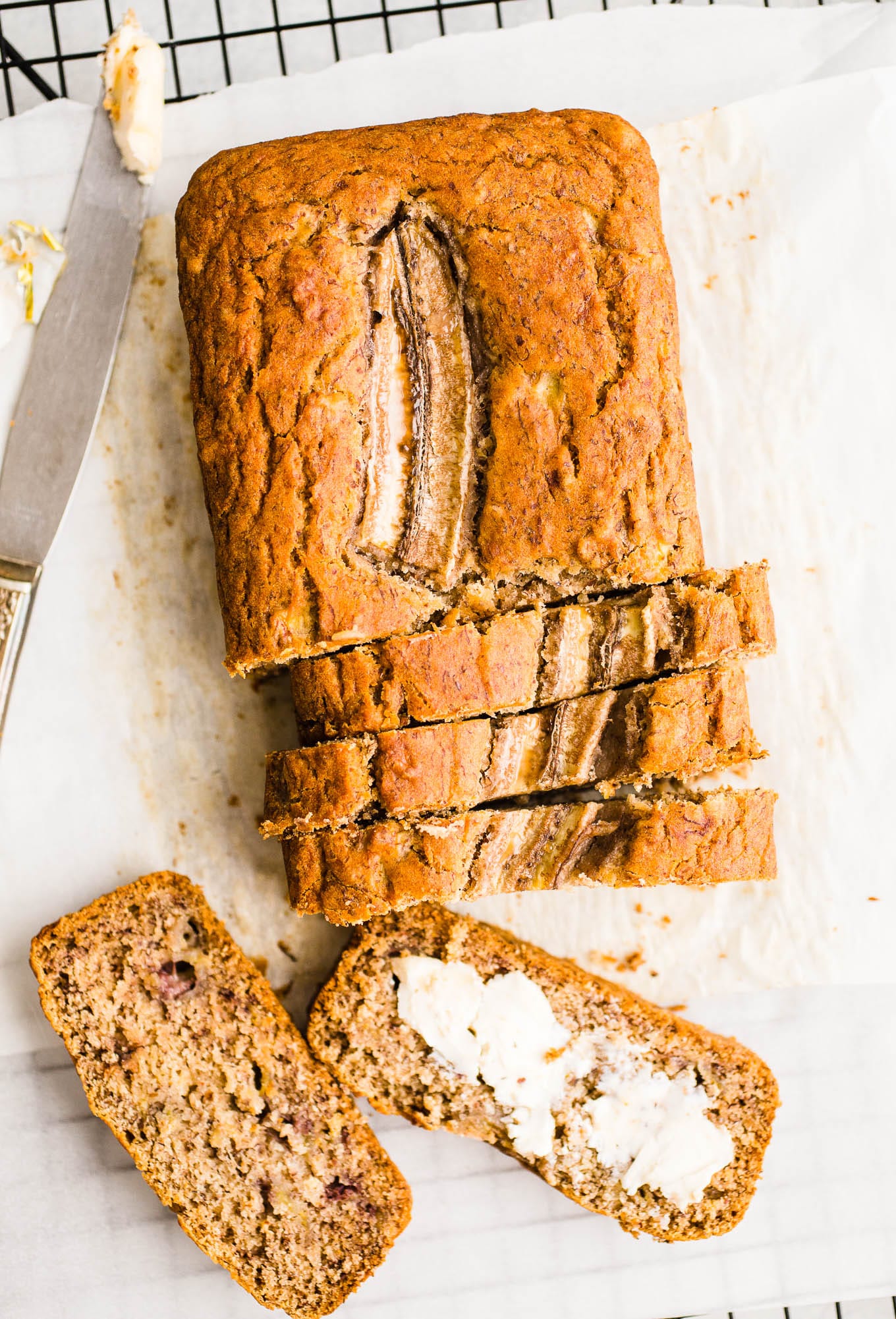 A banana bread loaf in slices. 