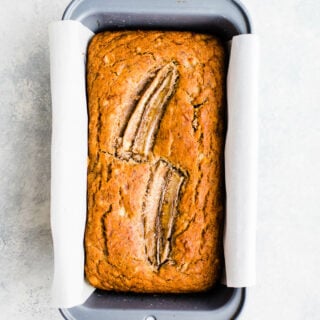 A banana bread loaf in a pan.