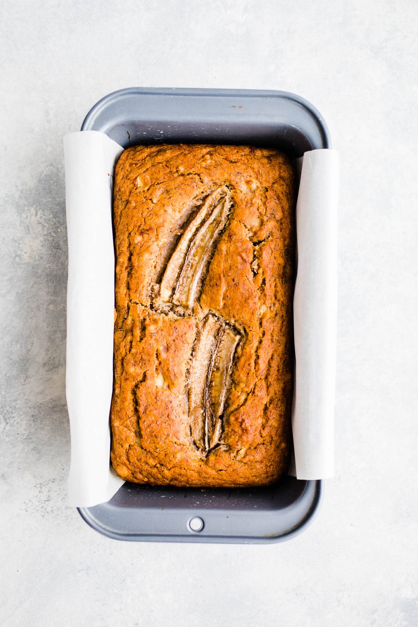 A banana bread loaf in a pan. 