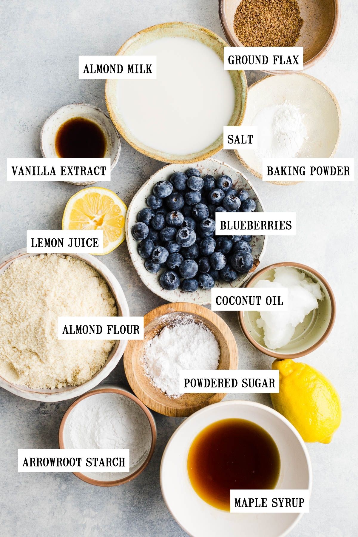 Ingredients to make scones in small separate bowls.