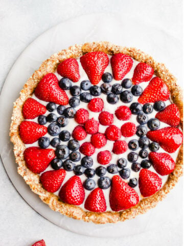 No-Bake Berry Tart on a marble lazy susan.