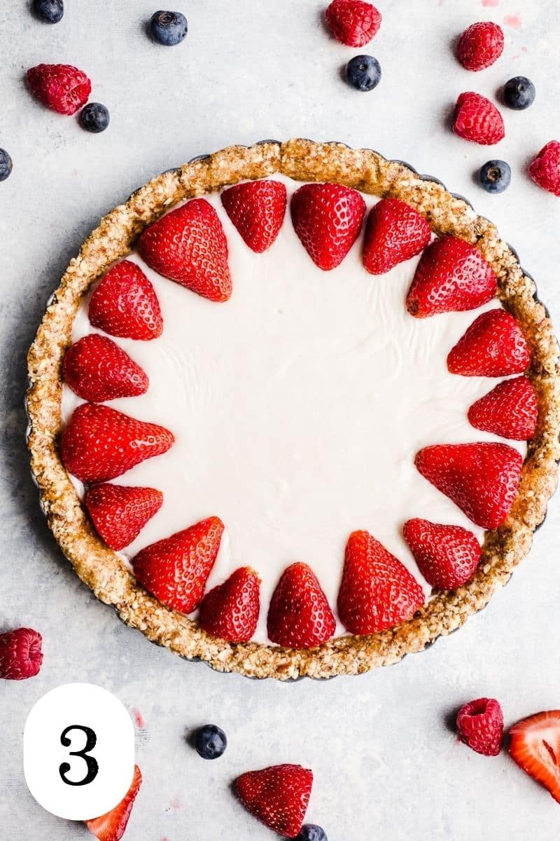 A vanilla tart with strawberries.