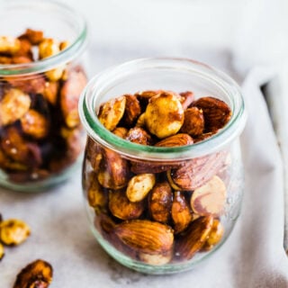 Curried roasted almonds in jars.