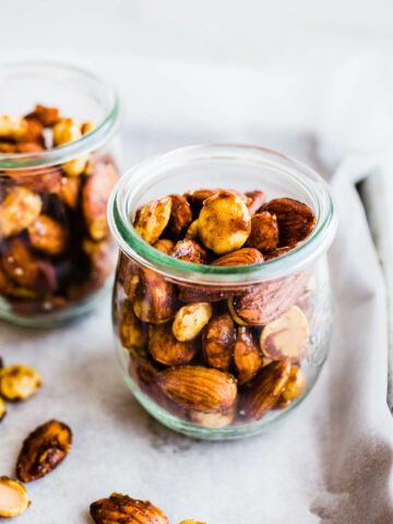 Curried roasted almonds in jars.