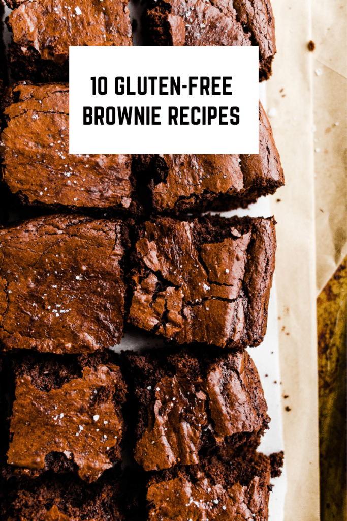 Freshly cut brownies on parchment paper.