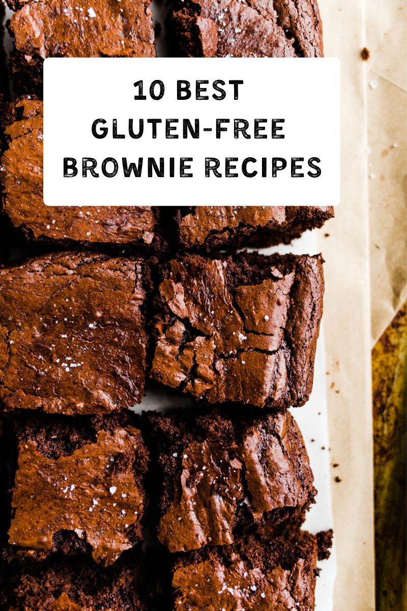 Chocolate brownies cut into squares on parchment paper. 