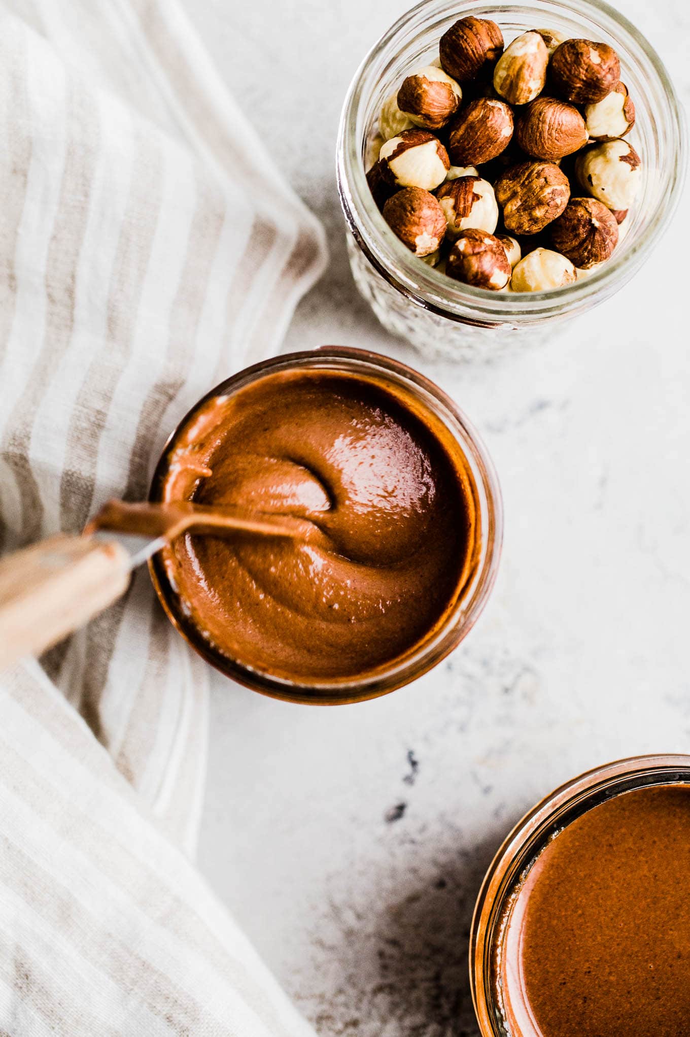 chocolate spread stirred in a jar