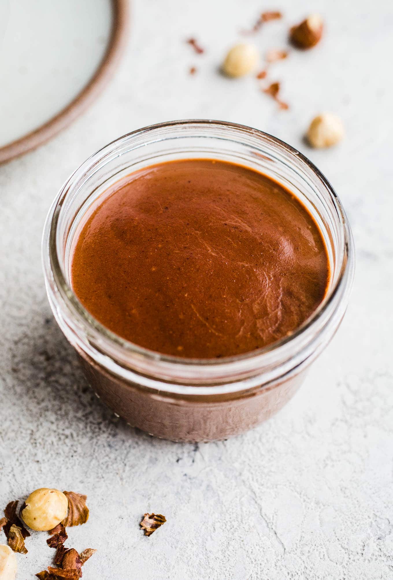 vegan chocolate hazelnut spread in small jar