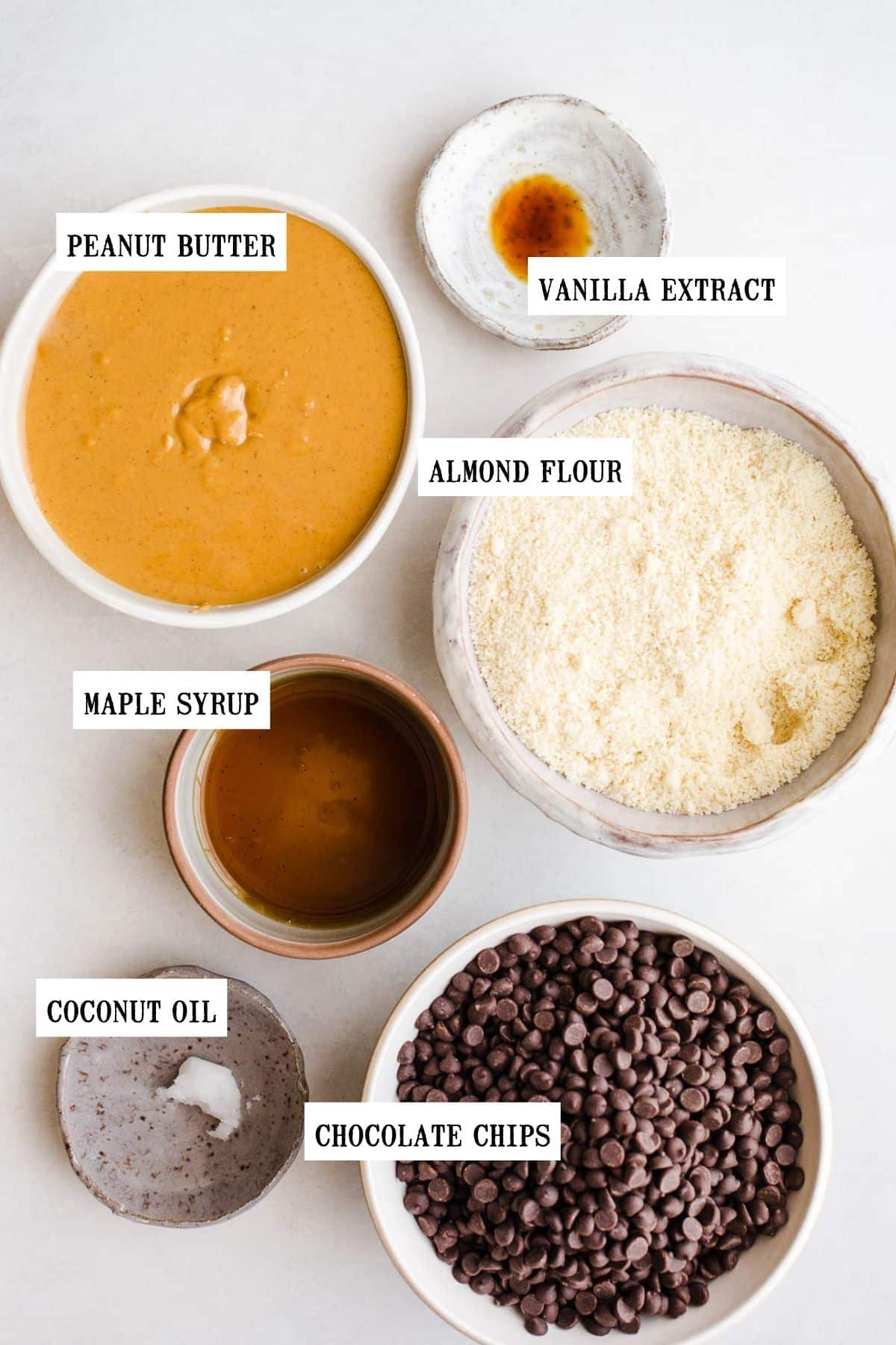 Ingredients to make Easter candy in separate bowls.
