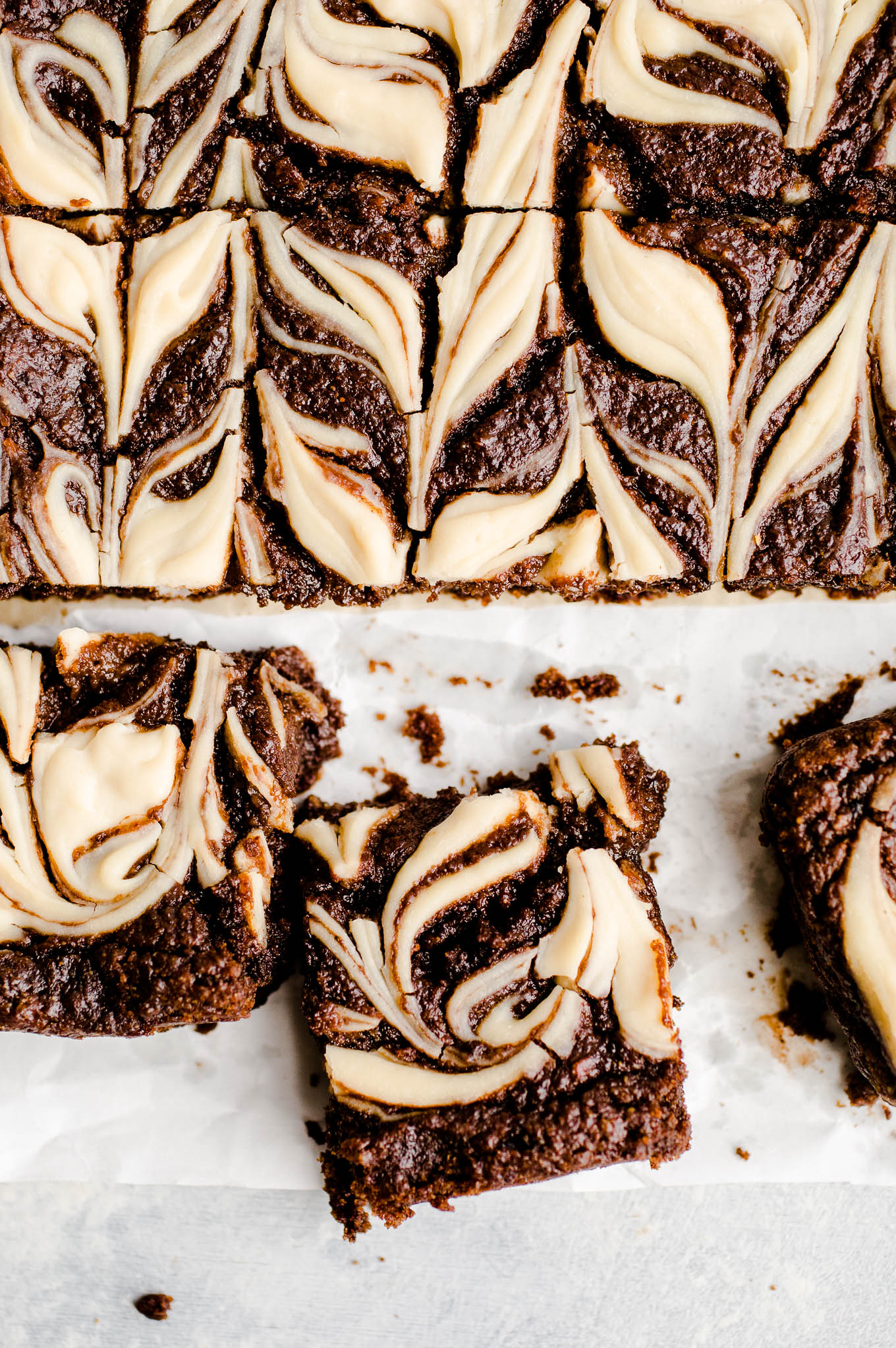 sliced brownies with white swirls
