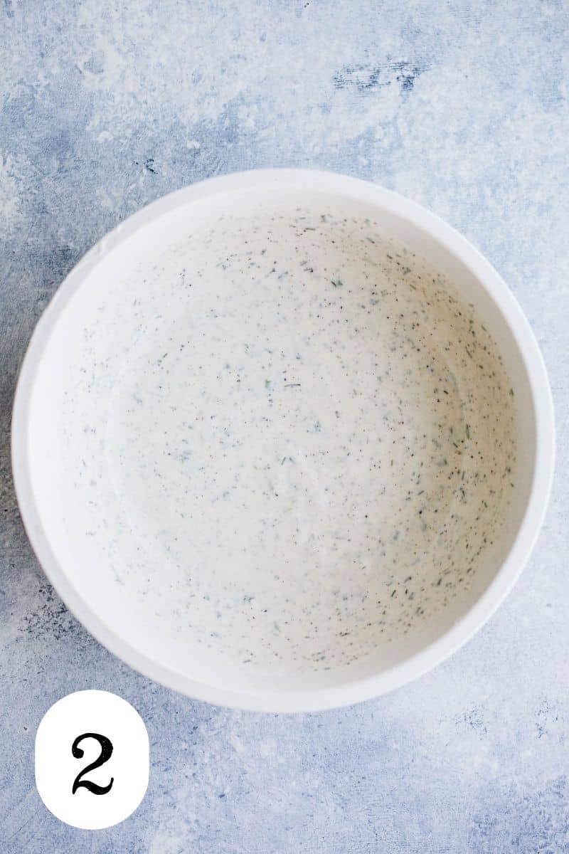 Freshly made ranch dressing in a mixing bowl. 