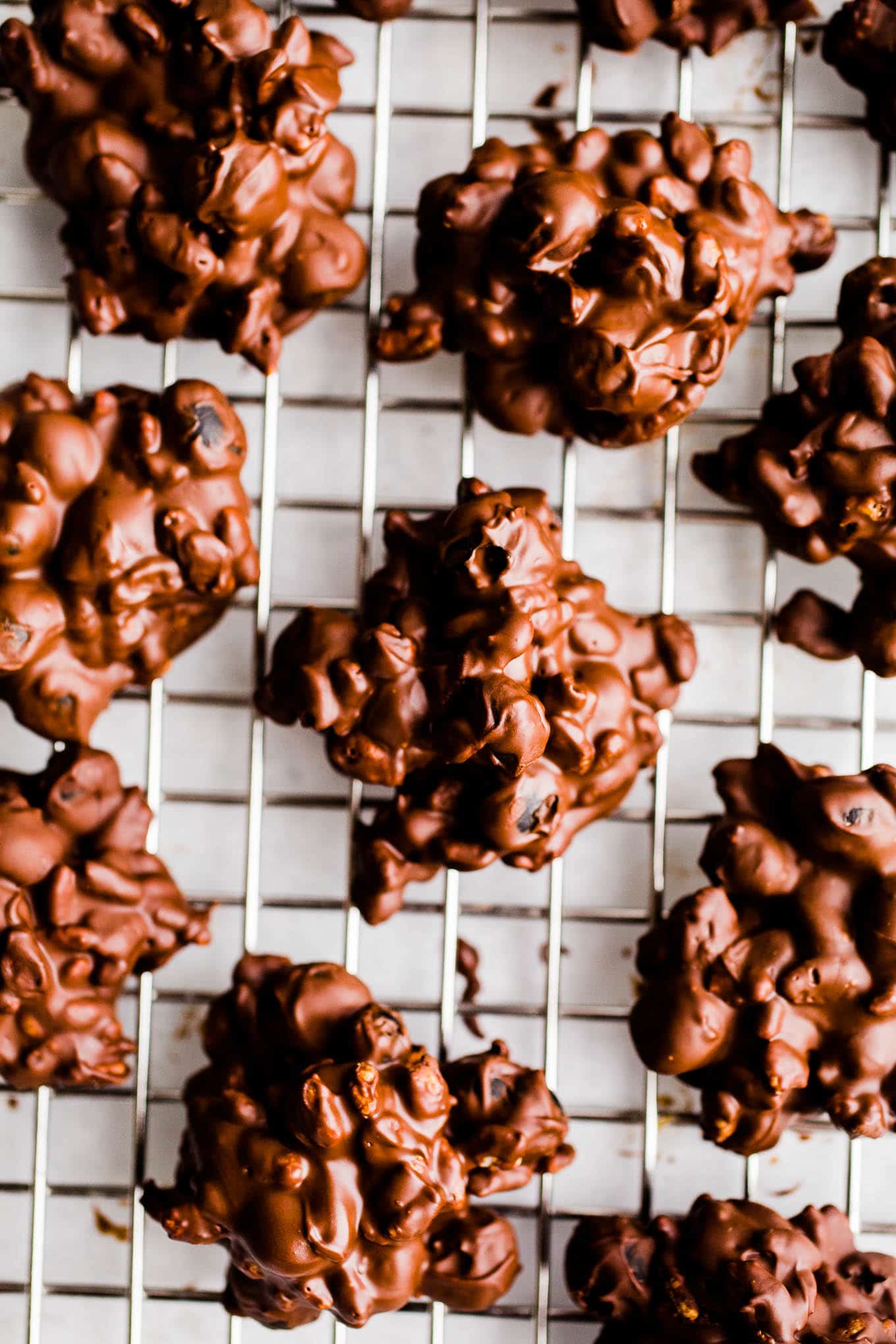 chocolate covered clusters on wire rack