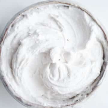 A bowl of coconut whipped cream.