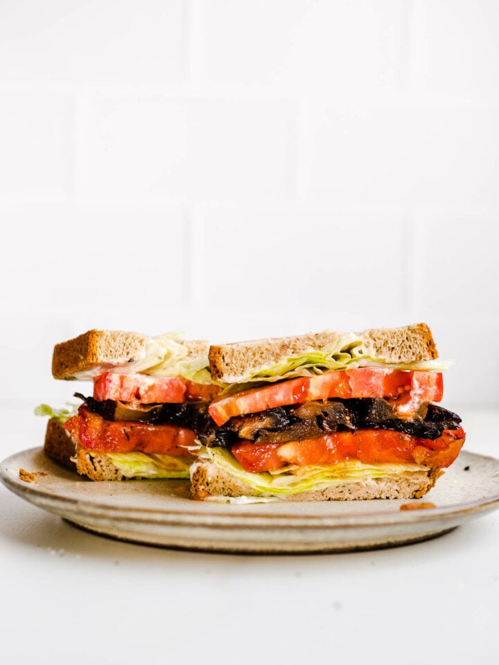 A blt sandwich on a plate.