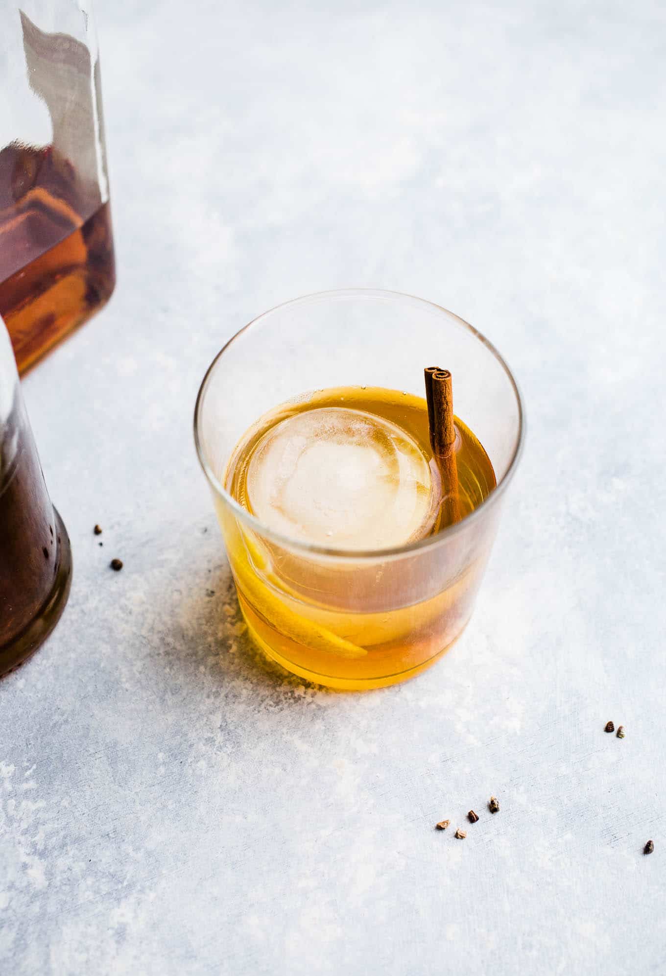 old fashioned cocktail with a cinnamon stick