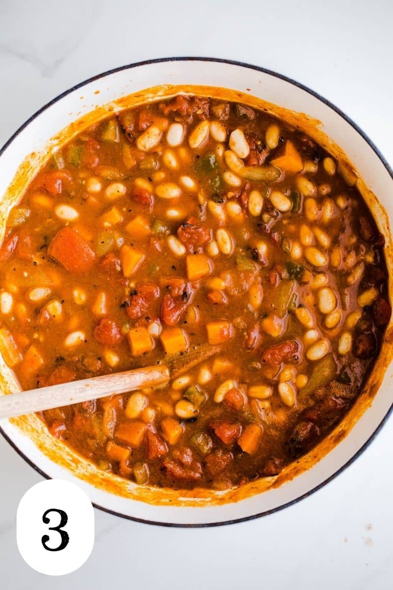White beans in a large pot of chili.
