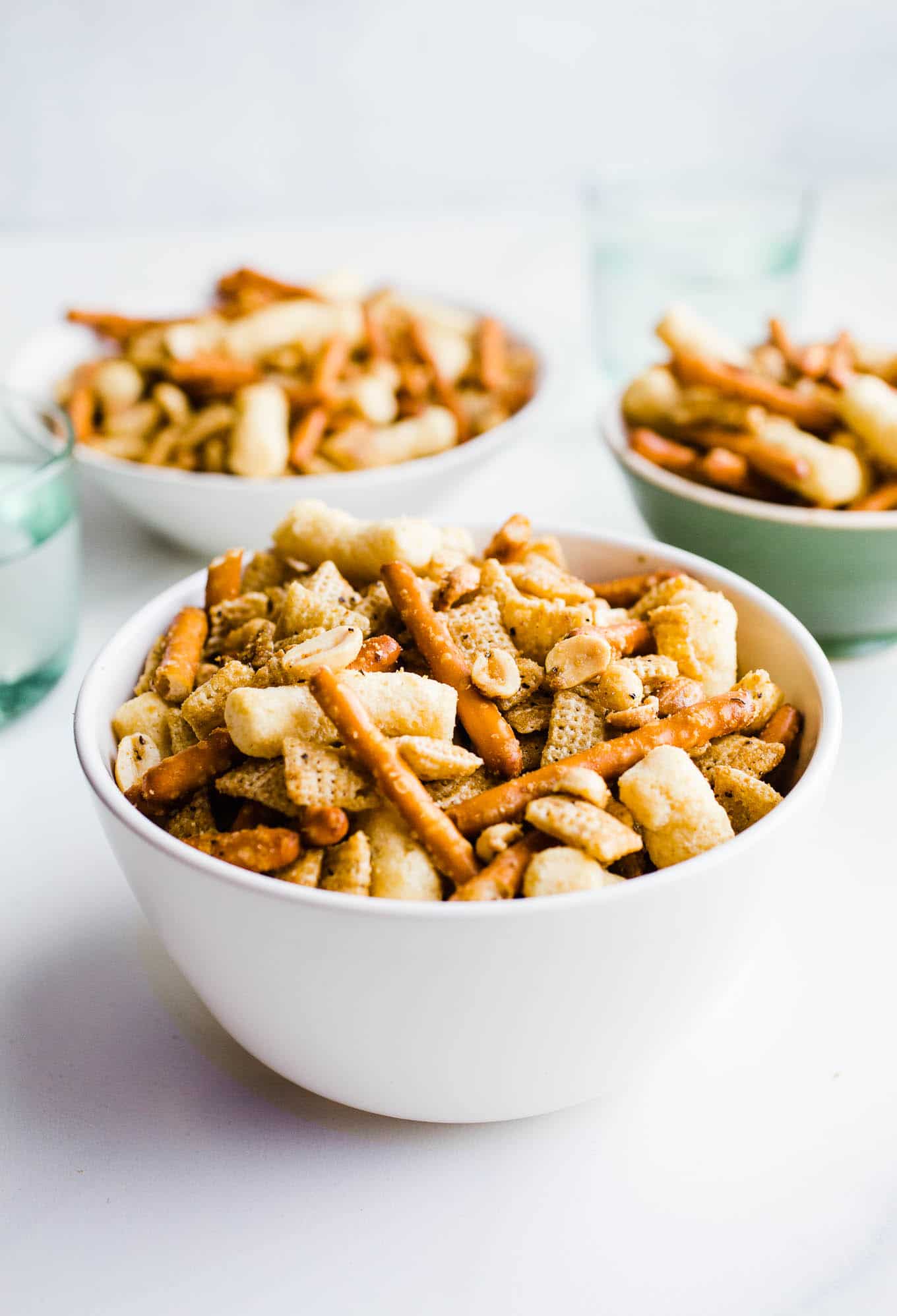 cheesy chex mix in bowls