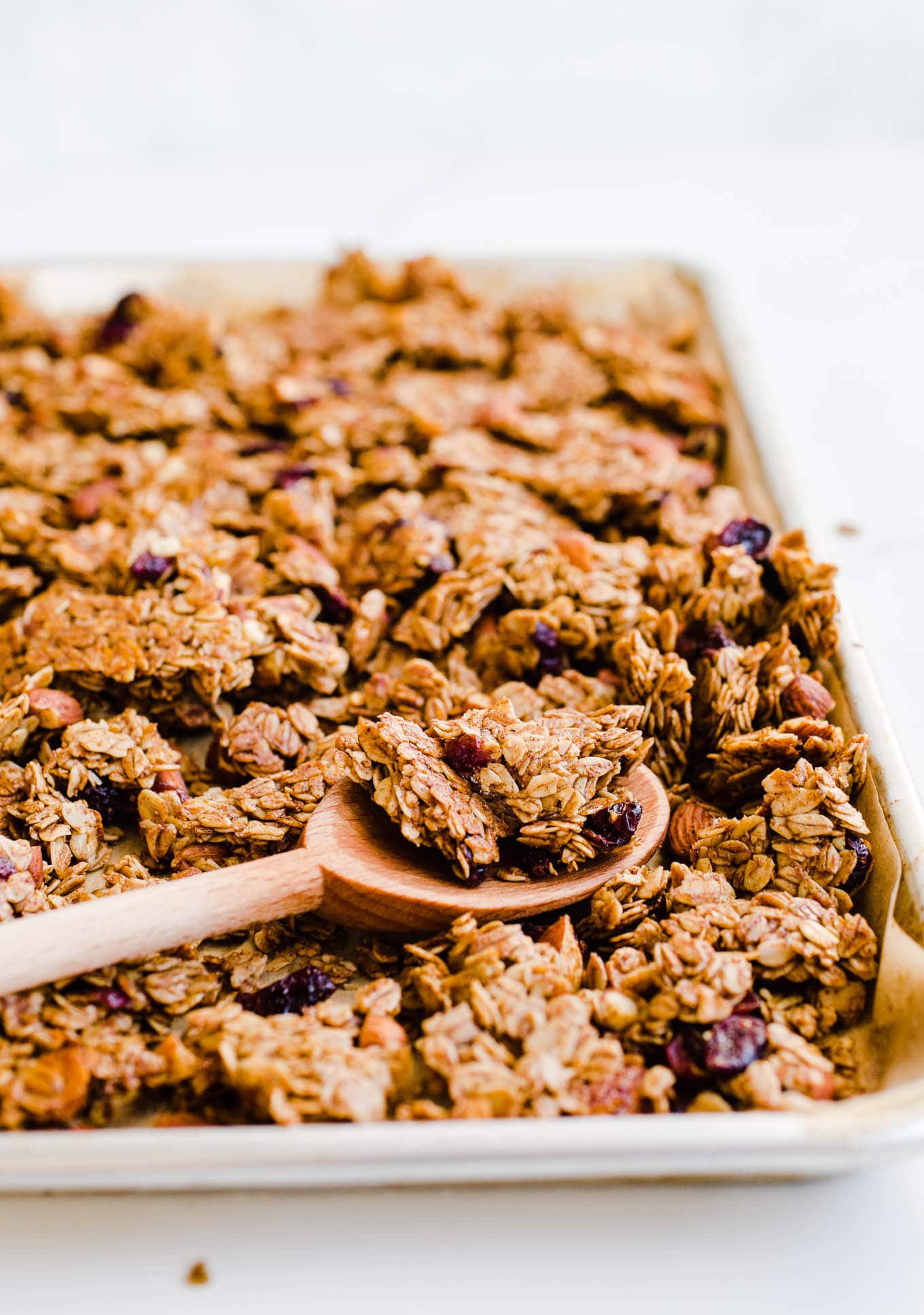 clusters of granola on a sheet pan