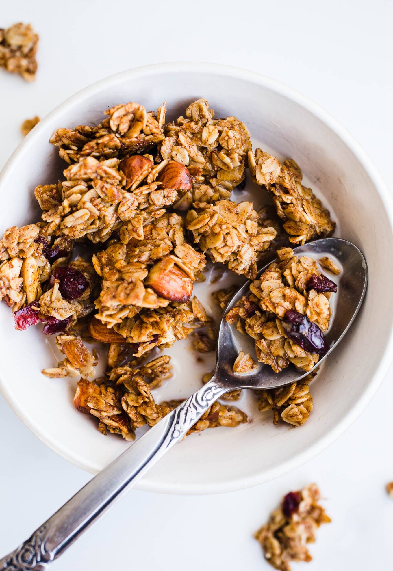 Gingerbread granola in a white bowl.
