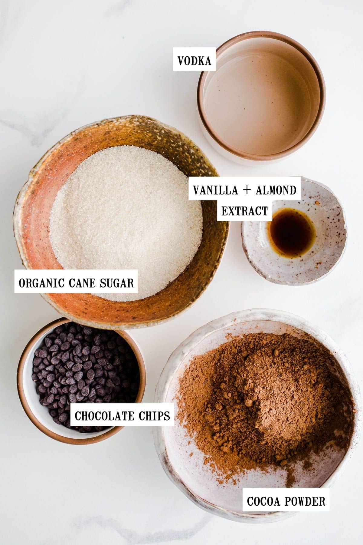 Ingredients to make a frozen treat in a small bowls.