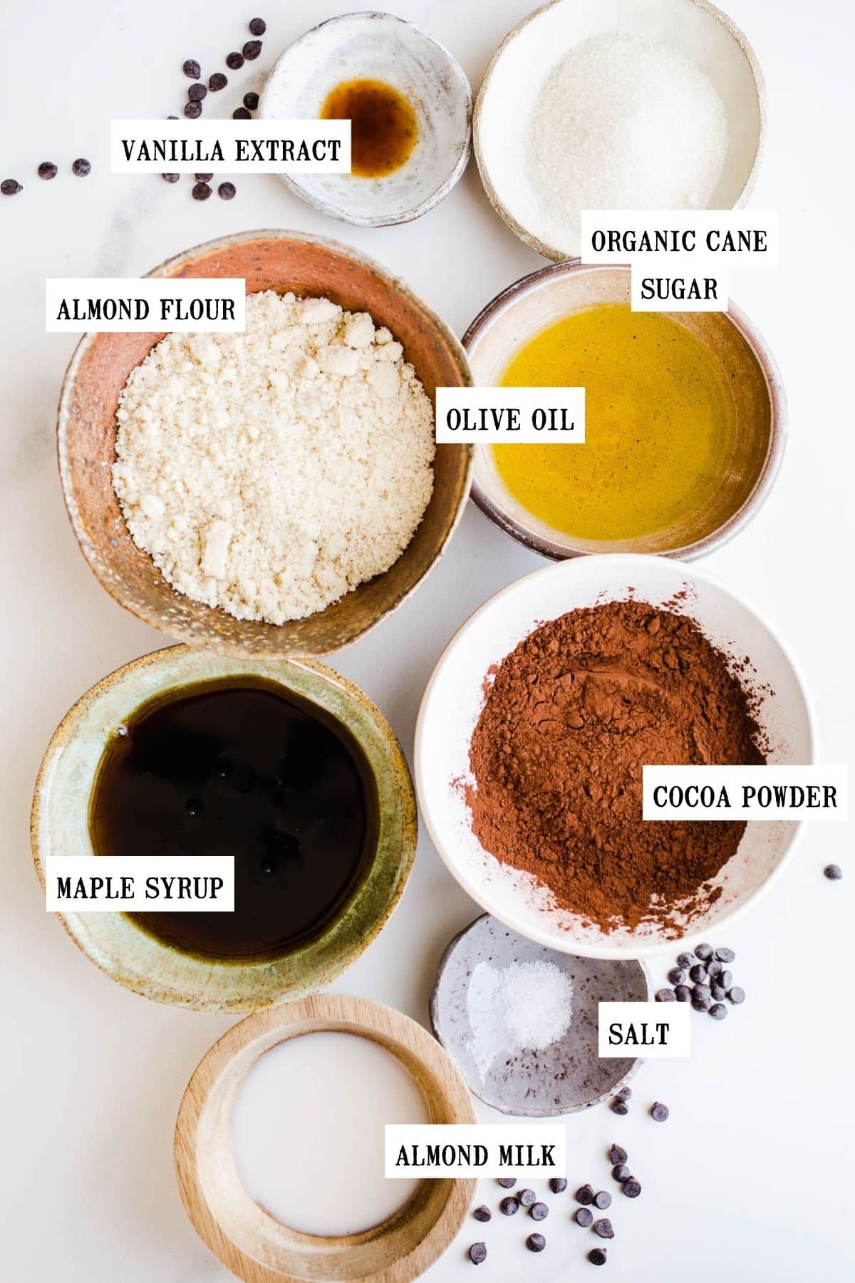 Ingredients in bowls of different sizes to make brownie batter.