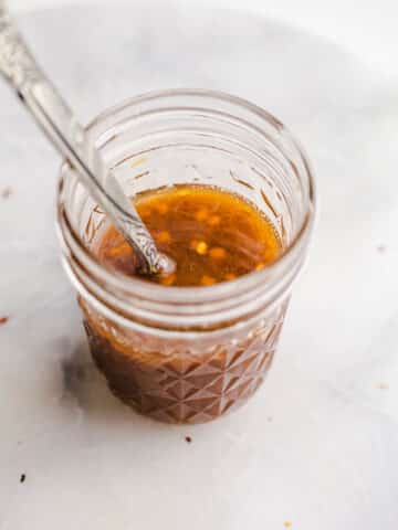 A mason jar with tamari sauce.