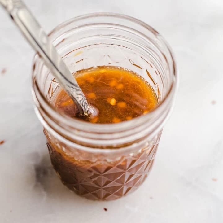 A mason jar with tamari sauce.