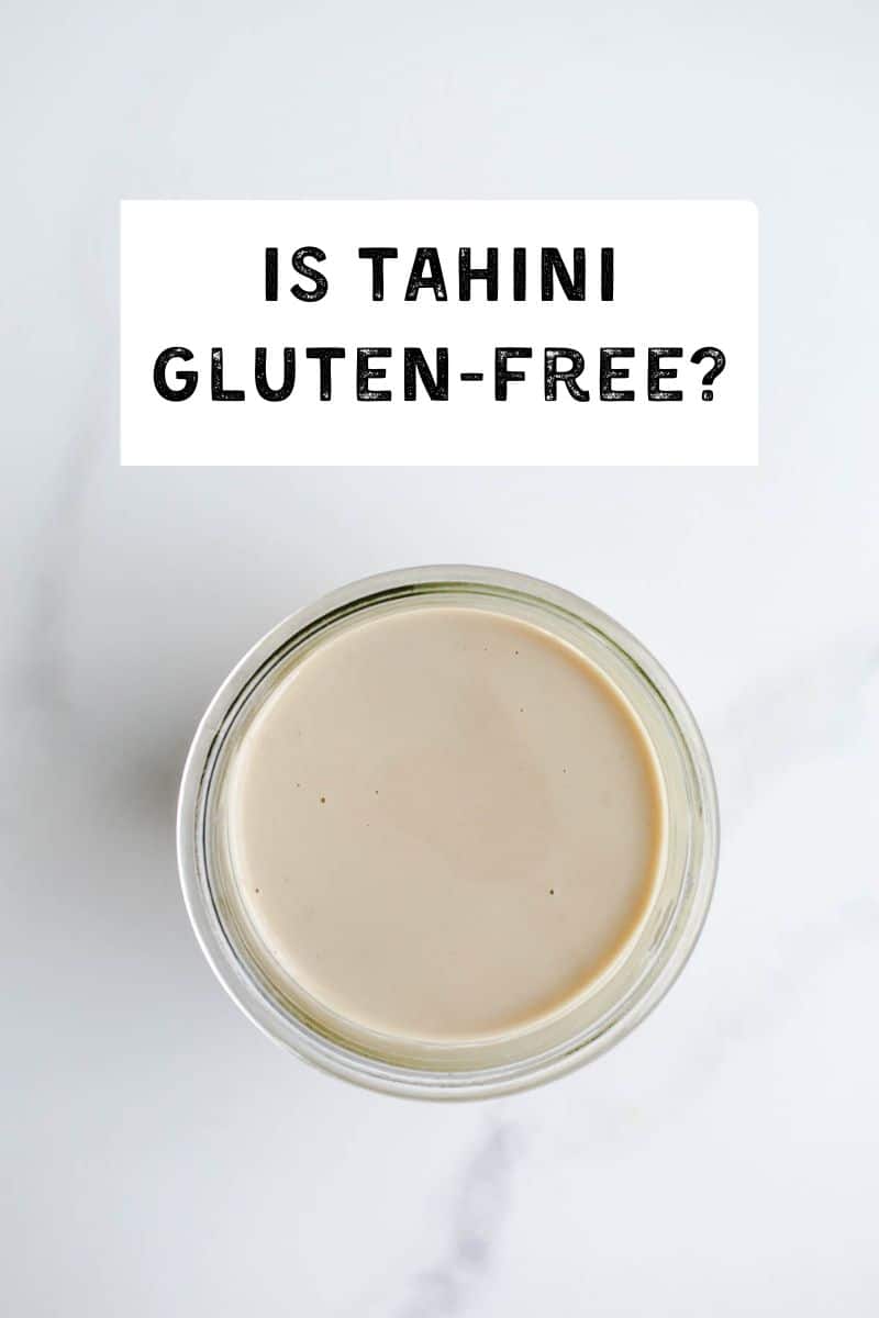 Sesame tahini paste in a glass jar.