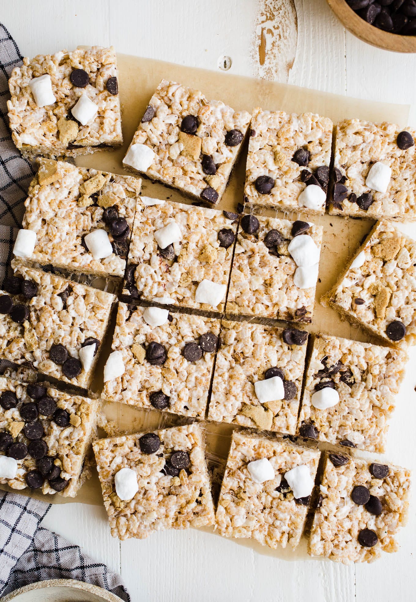 S'more cereal treats on a piece of parchment paper.