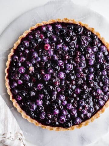 A tart filled with blueberry filling.