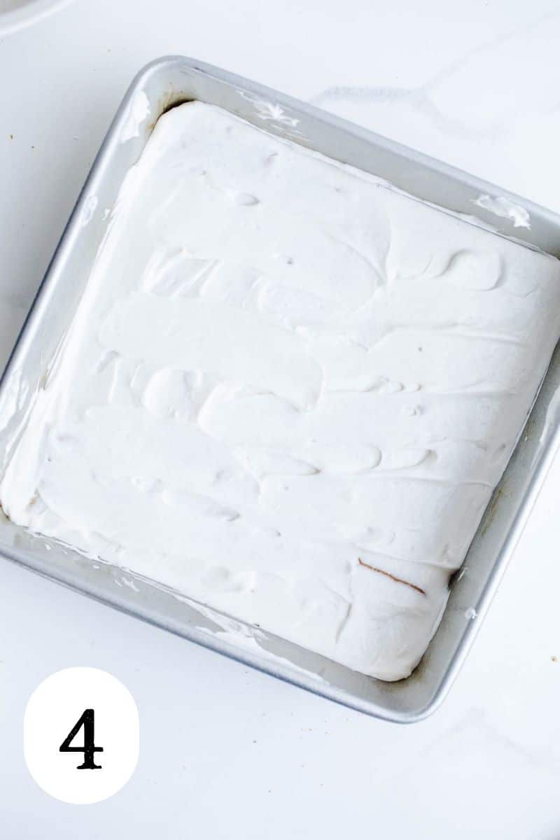 Whipped topping spread in a baking pan.
