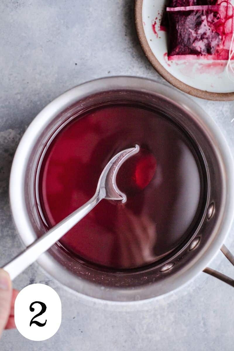Hibiscus syrup in a saucepan.