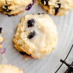 Blueberry cookies on a wire rack.
