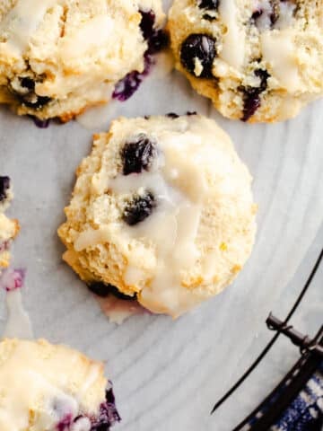 Blueberry cookies on a wire rack.