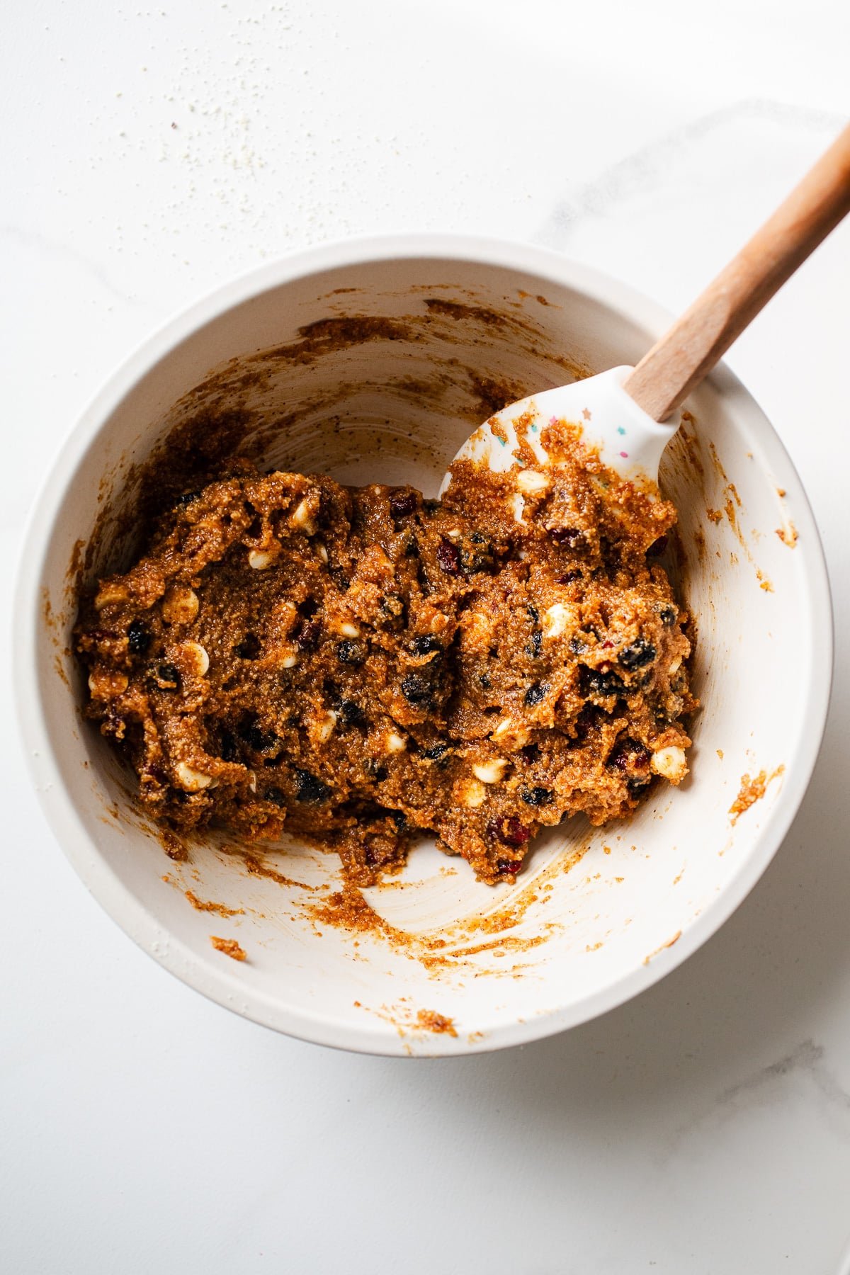 Cookie dough with chocolate chips and dried fruit.