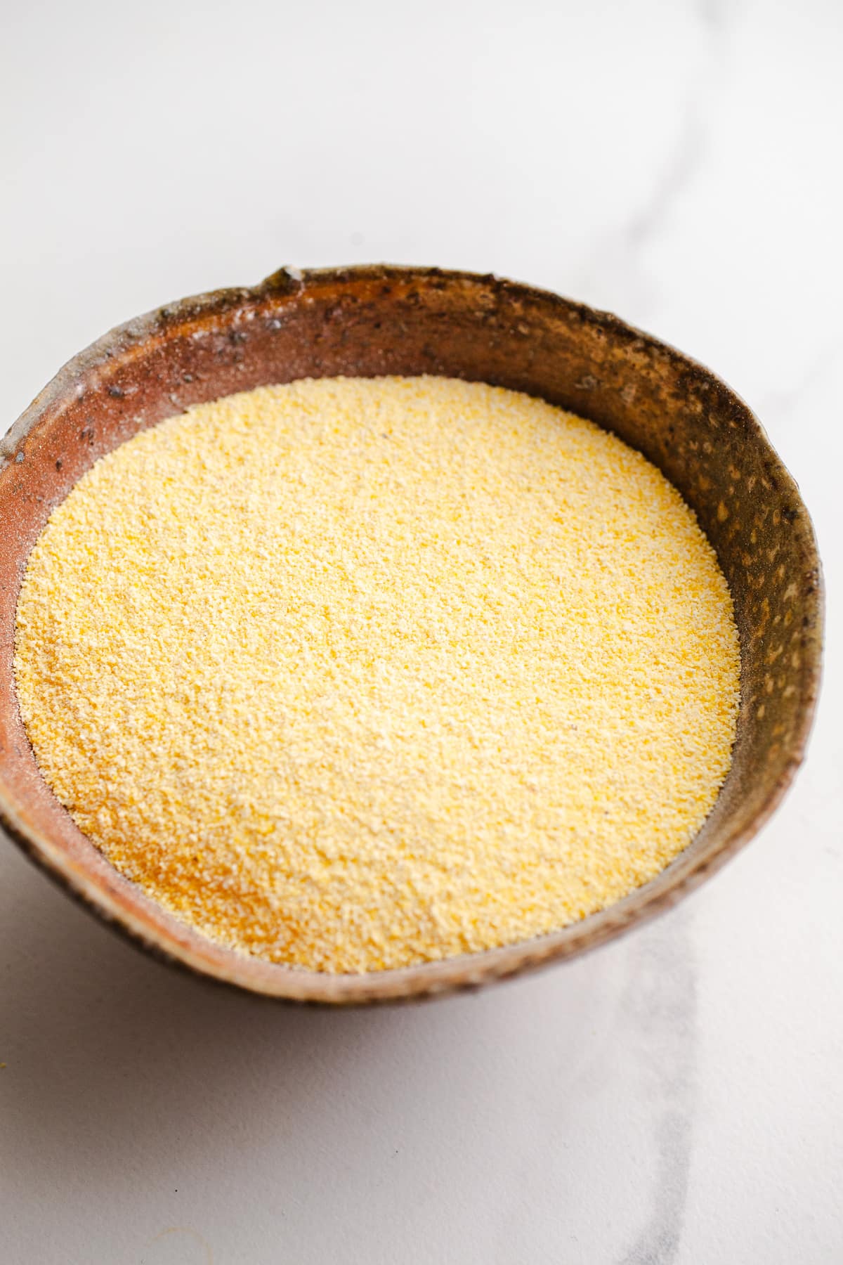 A large bowl of cornmeal.