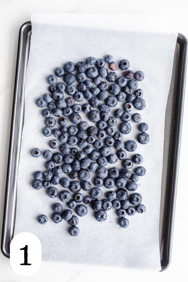 Blueberries on a sheet pan.
