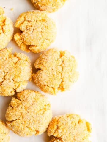 Corn flour cookies on parchment paper.