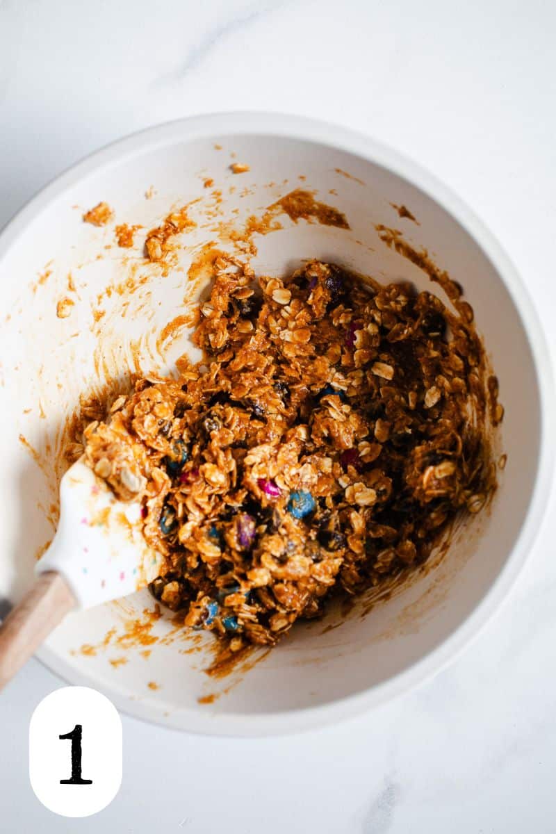 Monster cookie energy bite dough in a mixing bowl.